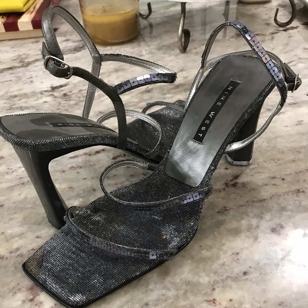 Women’s Dressy, Strappy, sparkly, Heals. The color is Gun Metal Grey. Size 8.5.
